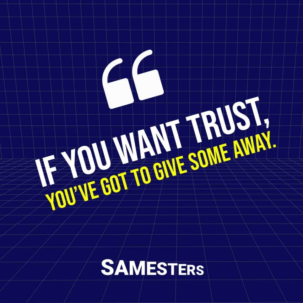 The text "If you want trust, you’ve got to give some away." There is a quote symbol above the phrase and a blue grid background.